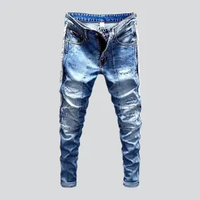 Distressed men's sanded jeans