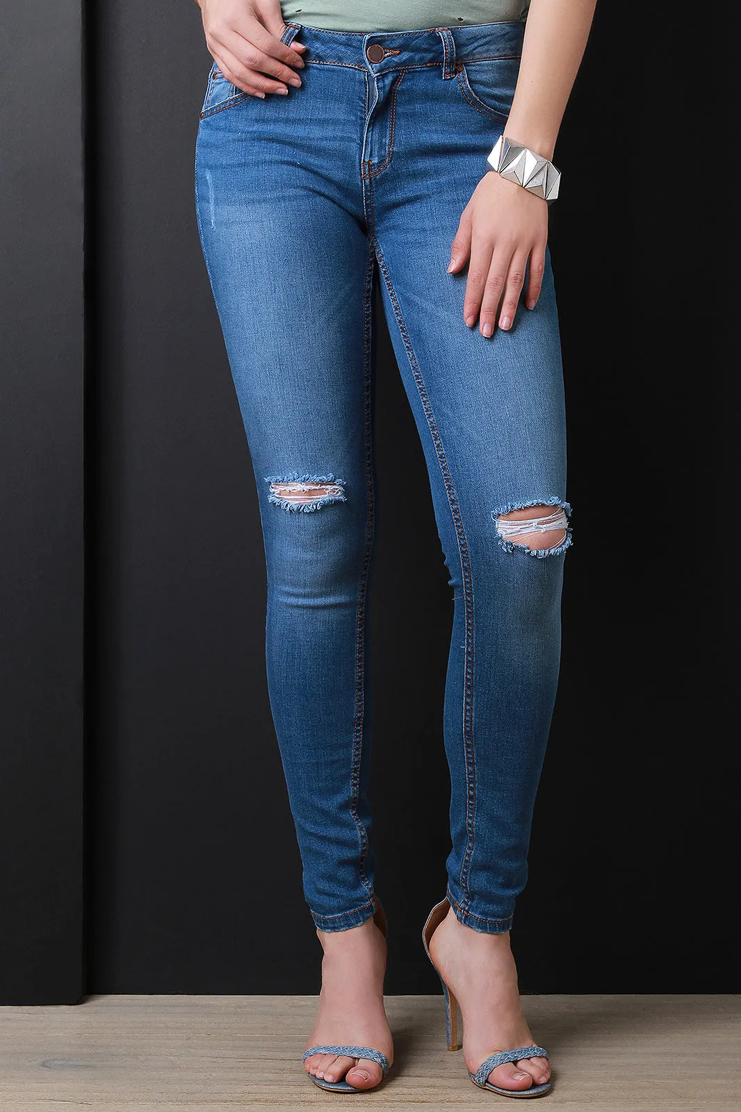 Mid Rise Distressed Knees Skinny Jeans