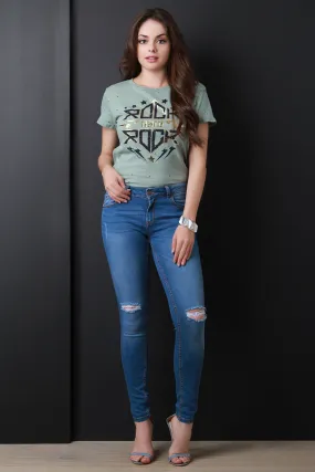 Mid Rise Distressed Knees Skinny Jeans