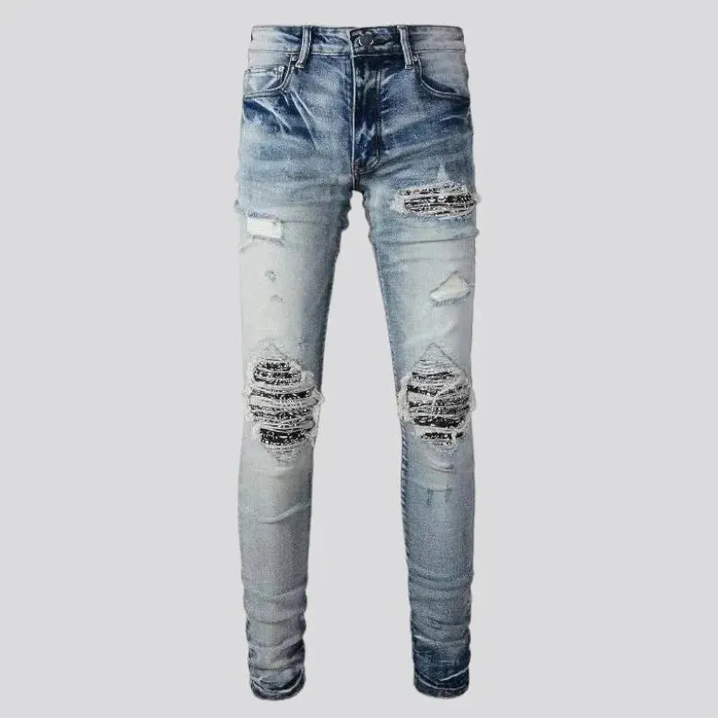 Patchwork men's whiskered jeans